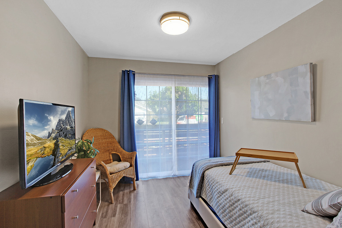A resident room opening onto the patio