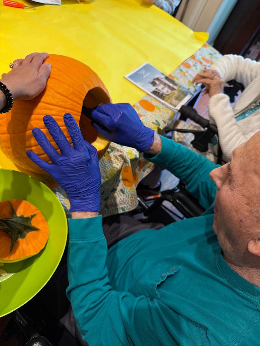 Pumpkin carving at a seasonal activity